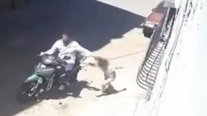 Küçük kızını motosikletle sürükleyen baba gözaltına alındı