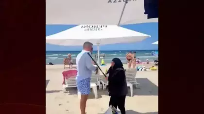 Plajda yaşlı teyzenin bastonuyla görevliyi kovaladığı anlar gündem oldu